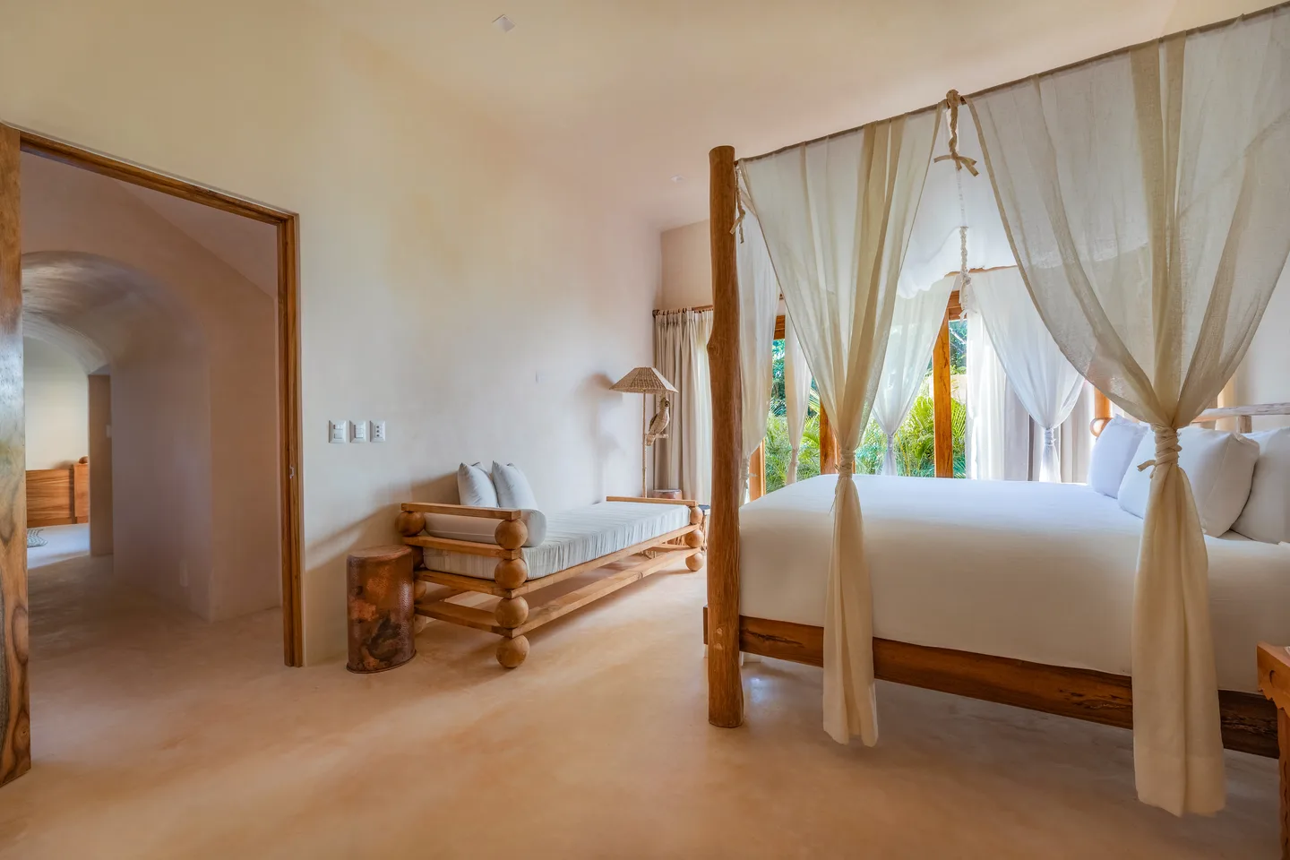 Canopied king bed with garden doors — Amulet Suite, La Valise Tulum