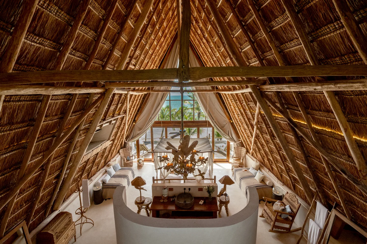 The Master Suite’s living area under the soaring palapa, open to the sea — Robinson Master Suite, La Valise Tulum